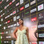 Krishna Gautam Makes A Stylish Statement In A White One-Piece.